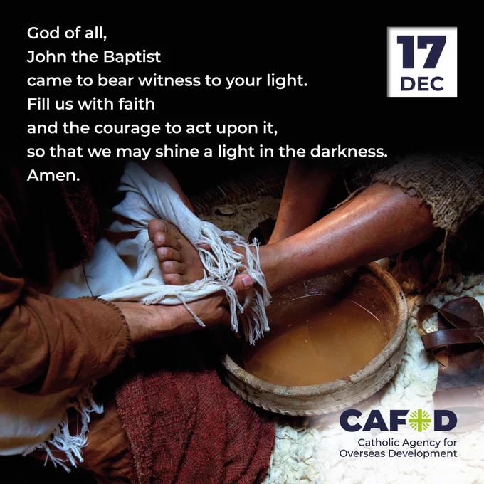 A photo showing one person washing another’s feet in a bucket. The text says: “God of all, John the Baptist came to bear witness to your light. Fill us with faith and the courage to act upon it, so that we might shine a light in the darkness. Amen.” 