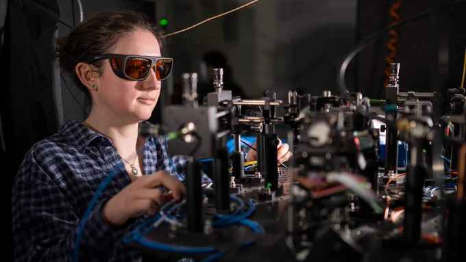 Early career researchers operating Institute for Compound Semiconductor apparatus in the laboratories of Cardiff University’s Translational Research Hub.