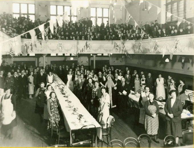 Group of adults celebrating at the Christmas Party, Municipal Hall, Colne (c.1930)