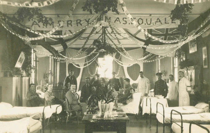Belgian soldiers sitting in a group at Bank Hall Military Hospital, Burnley (1914)
