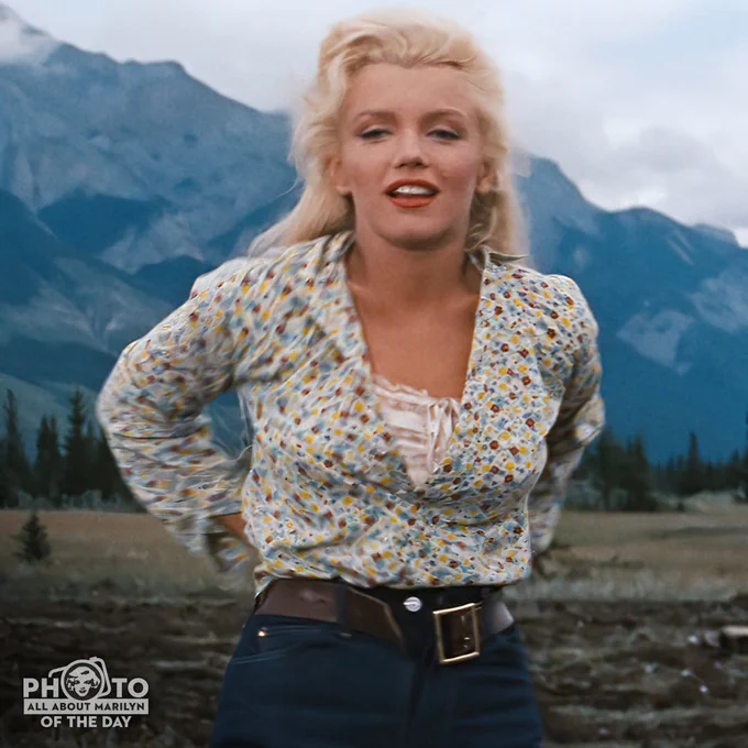 Marilyn Monroe tucking in her shirt in the film River of No Return