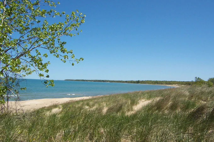 Shoreline with beach.