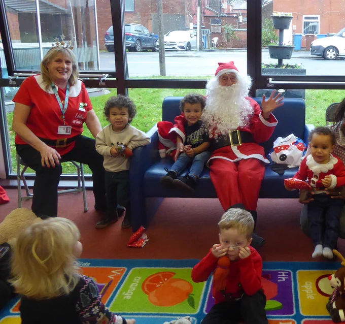 children with father christmas