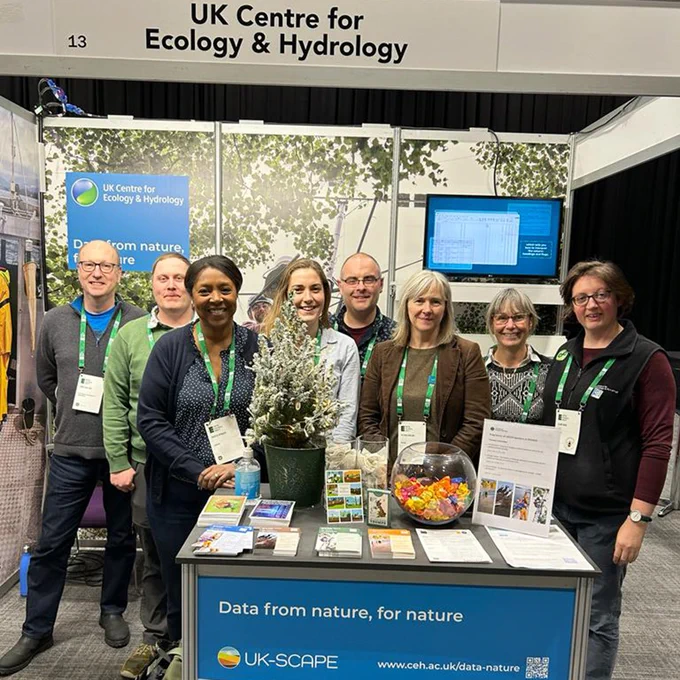Eight UKCEH people on the Data from nature, for nature stand at BES2023