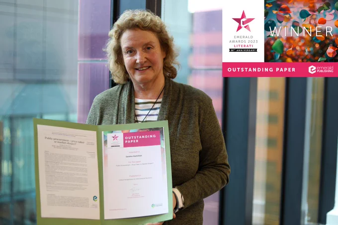 Photo of AMBS PhD candidate Sandra Hamilton, who has won the 2023 Emerald Literati Award for most outstanding paper published in Critical Perspectives on International Business. 
The paper, Public Procurement – Price-Taker or Market-Shaper?, downloaded over  2,000 times during COP 27 in Egypt and COP28 in Dubai, examines the role of government procurement as a social policy mechanism within a multilateral open trading system. 
Sandra, who has twice been invited by the World Trade Organisation (WTO) to present her work in Geneva, said: “I’m especially delighted as a key selection criterium for the award is to recognise research that creates impact and generates real change beyond academia.
