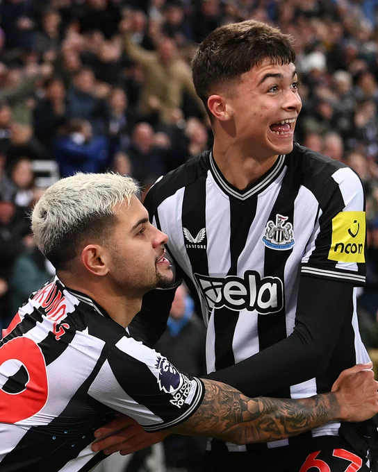 Lewis Miley and Bruno Guimarães celebrate Lewis' goal