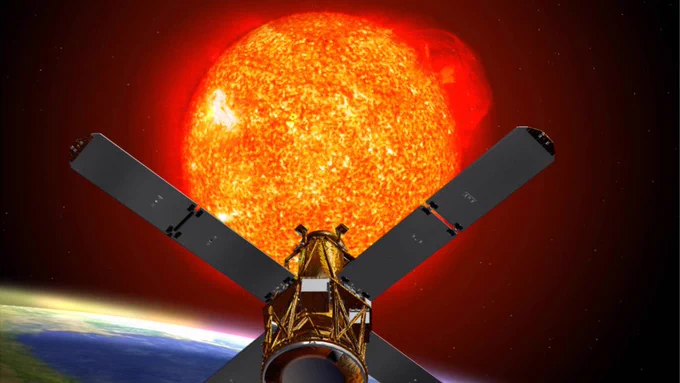 Image shows an artists depiction of the RHESSI spacecraft observing the sun. RHESSI is a gold and dark grey satellite, the sun is orange, yellow and red, with a glowing red corona.