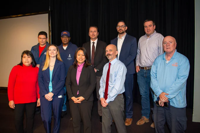 OGS Commissioner Jeanette Moy stands with #TeamOGS members at the 2023 Years of Service Awards Ceremony.