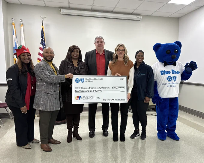 NASCAR Chicago and Blue Cross and Blue Shield of Illinois presenting a big check to Roseland Community Hospital.