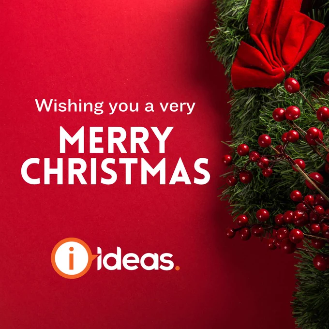 Green foliage and red berries with a red bow. Text says "Wishing you a very Merry Christmas. IDEAS."