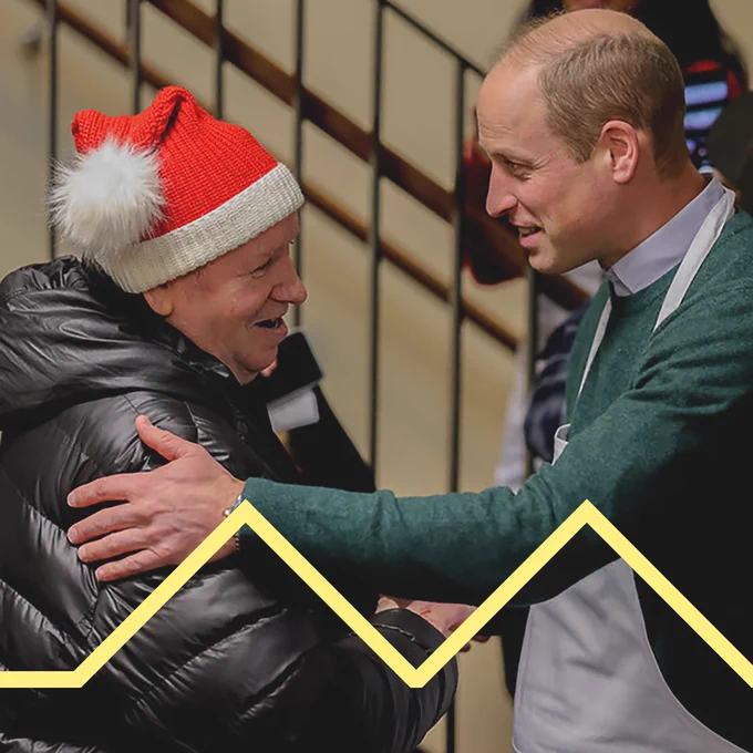 Prince William shaking hands with someone at The Passage.