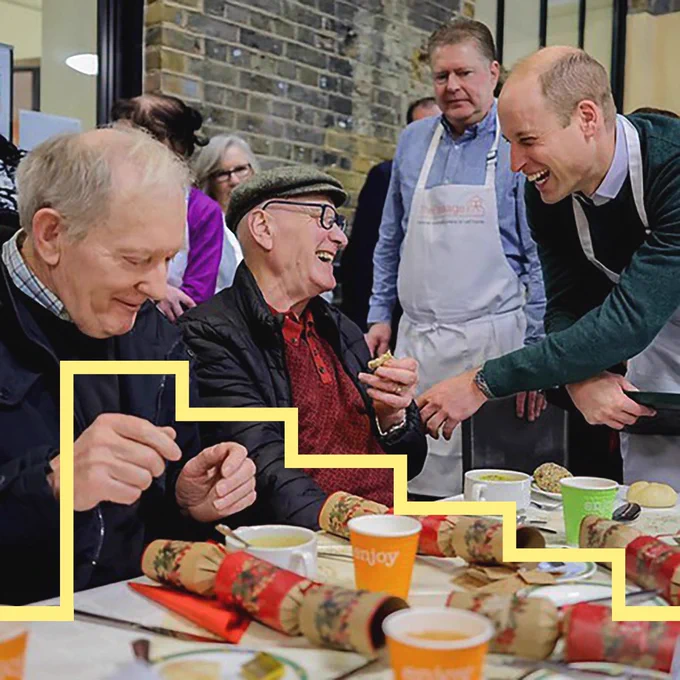 Prince William in conversation with a group of people at The Passage.