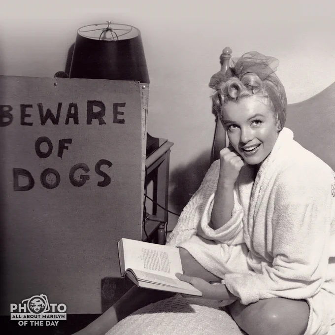 Marilyn Monroe with Beware of Dogs Sign