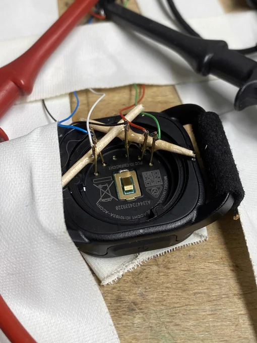 GoPro Shutter remote from selfie stick battery compartment test points.