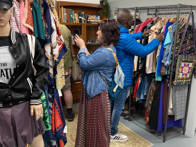 People browsing vintage section of new second hand shop on Gateshead High Street