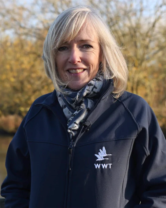 WWT's Dr Ruth Cromie standing in a wetland landscape
