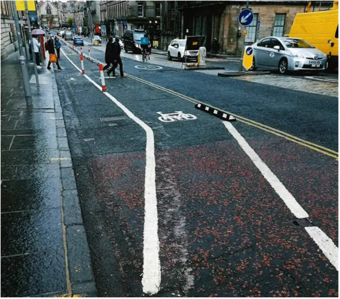 Designated cycle lane on George IV bridge in Edinburgh. Part of the 'Spaces for People' initiative.