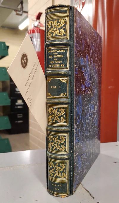 Color image. View of spine of the book, "The women of the court of Louis XV" by Imbert de Saint-Amand, translated into English, published in 1892