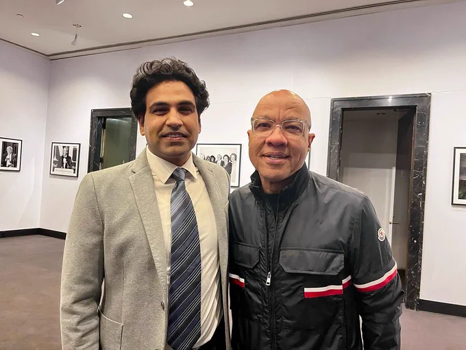 Darren Walker and Gaurav J Pathania pose together indoors