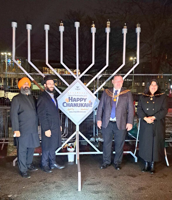Civic leaders and faith leaders at Chanukah lighting in Plymouth.