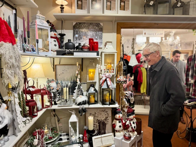 Gov. Evers views holiday decorations.