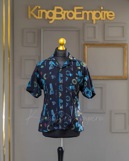 Unleash your inner cardsharp with the Playing Cards Revere Short Sleeve Shirt – a sartorial masterpiece crafted by the visionaries at 👑 King Bro Empire. Shop 🛒 at https://www.kingbroempire.com/shop or Call ☎  447838239617

This isn't merely a shirt; it's a deck of style, meticulously designed to infuse a touch of playfulness into your wardrobe while maintaining the sophistication that defines our brand. 
#CardStyle #KingBroChic #PlayfulFashion #DeckedInStyle #shirts #shirts #kingbroempire #clothingbrand #fashion #Style  #clothing #themirrorcollection