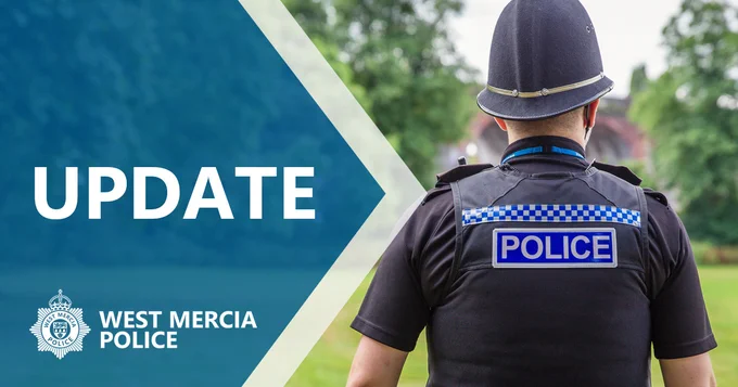 Update title with police officer facing away from the camera with hat on 
