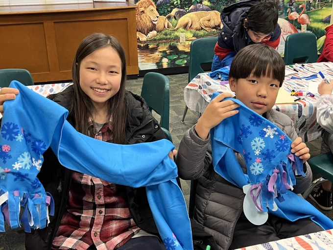 Kids with handmade scarves