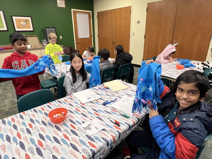Kids with handmade scarves
