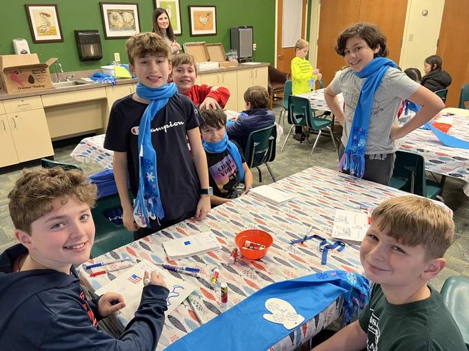 Kids with handmade scarves
