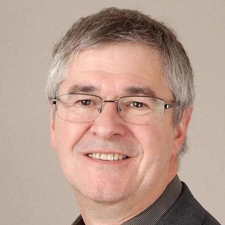 A headshot of Professor Julian Richards