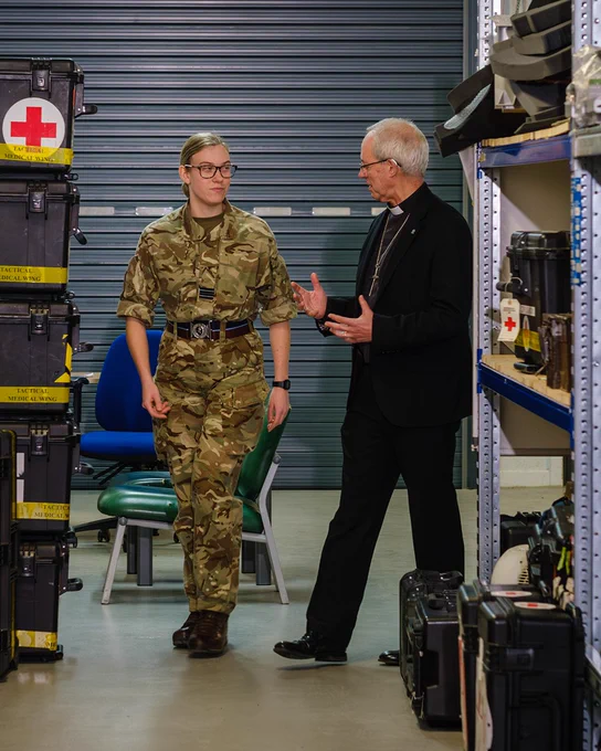 Archbishop Justin Welby speaks with a member of the RAF while filming his New Year Message at RAF Brize Norton. 