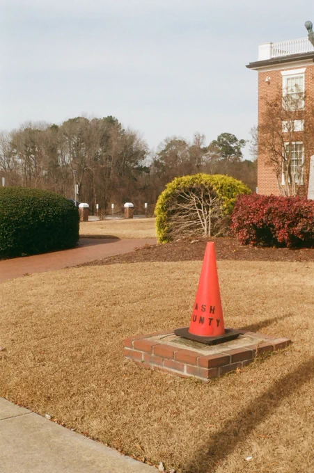 Lonesome Cone in the Nashville NC Court House lawn.  
Taken with Kodak 35 Rangefinder on Kodak Gold 200. 