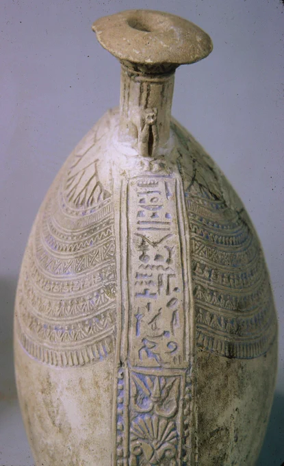 The original glaze would have been a bright turquoise, and the decoration filled with a darker blue to imitate lapis lazuli. 