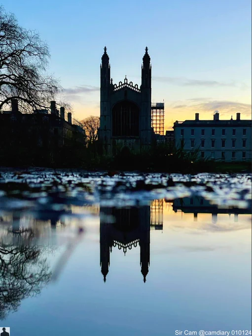 King’s College Chapel, Cambridge, reflected in a puddle at sunrise time.