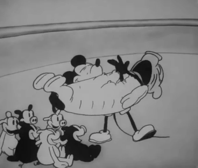 Mickey Mouse has kicked 6 piglets off their mother’s teats, and is now holding the mother pig in the air and honking her nipples whilst squeezing her body like some kind of porcine accordion, all whilst grinning his head off. Again, this is all genuinely from Steamboat Willie