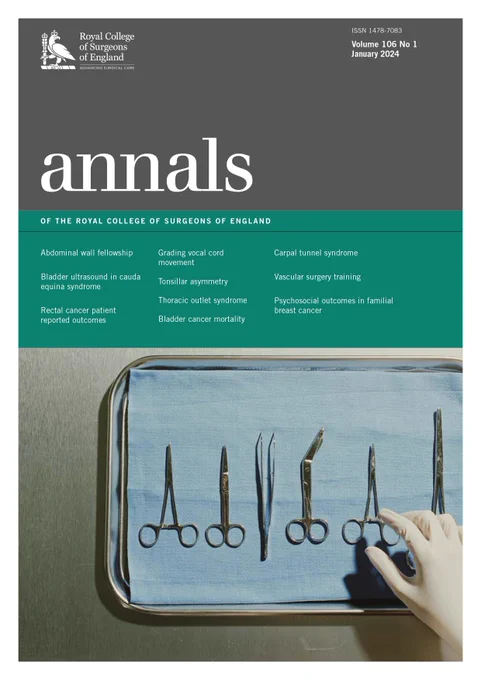 The front cover of the latest edition of the Annals. It features a photograph of a hand selecting a surgical tool from a tray.