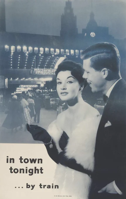 Advertisement showing a woman and man dressed up for a night out on the town. Behind them is a nighttime street scene featuring illuminated buildings, vintage cars, and pedestrians. The text on the advertisement reads: in town tonight... by train.
