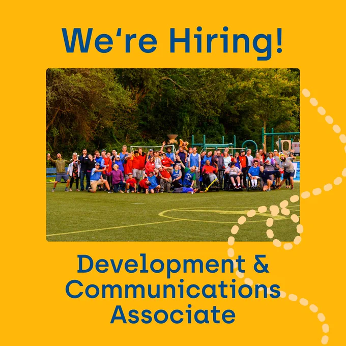 A graphic including a photo of a large group of people on a field wearing pinnies after a wiffle ball game all making silly faces with the words "We're Hiring!" above and "Development & Communications Associate" below.