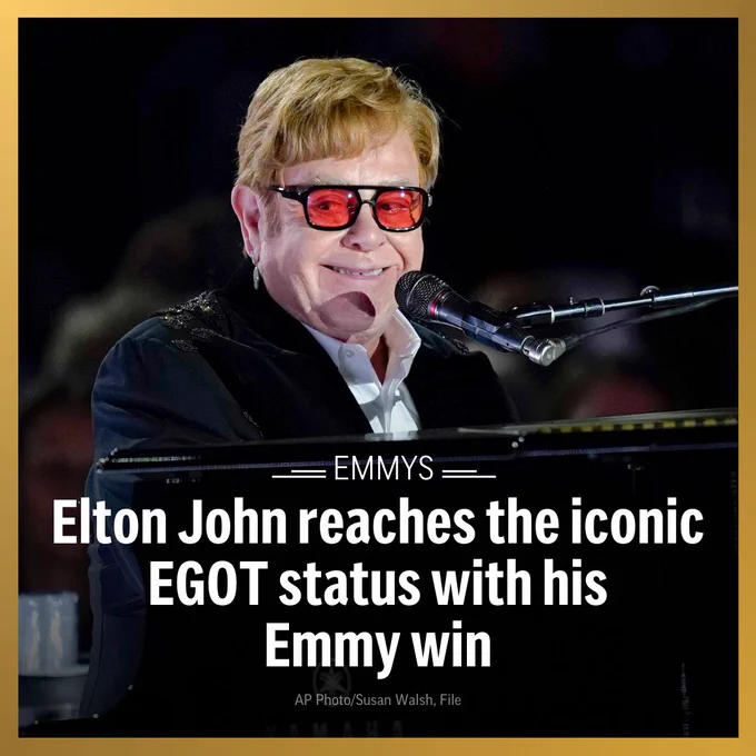 Photo of Elton John. Text: Emmys: Elton John reaches the iconic EGOT status with his Emmy win. 
