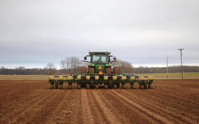📸 2: Shawn Peebles planting 30 acres of Green Chickpeas last Thursday, January 11th