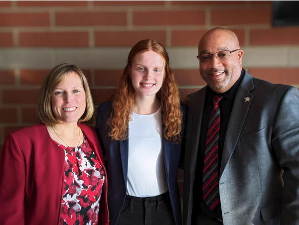 Springdale Elementary School Principal Lisa Tenbarge, PHS student Lillian Edmiston, and Superintendent G. Elgin Card 