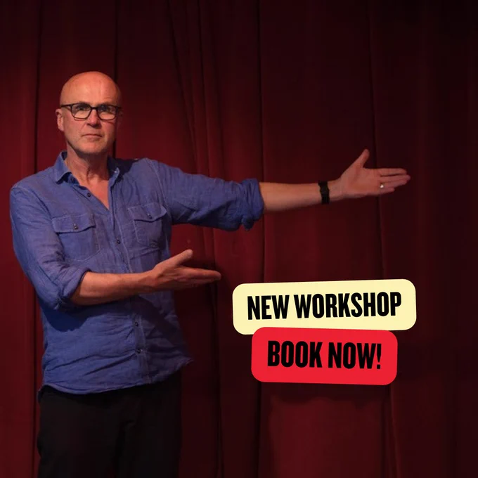 Tim Crouch stands in front of red stage curtains, holding his arms and hands out, palms up to the left side of his boy. Underneath there is text that reads NEW WORKSHOP BOOK NOW!