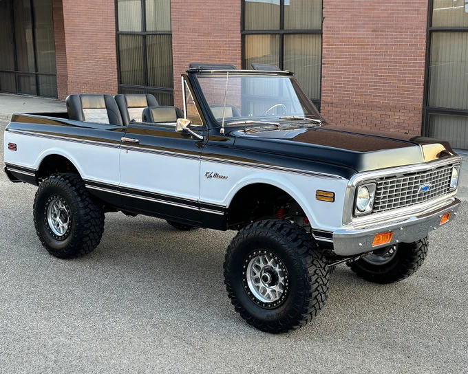 This custom 1972 Chevrolet K5 Blazer has received a fresh complete frame-off nut-and-bolt restoration. It is powered by a fuel-injected all-aluminum 530hp 6.2-liter LS3 BluePrint Racing crate engine backed by a brand-new ITE 4-speed 4L60E automatic transmission. This Blazer is equipped with Holley Terminator X power management, aluminum radiator with electric fans, custom LS valve covers, 92mm throttle-body, a Vintage Air system and a new black powder-coated billet serpentine pulley system, as well as power steering, power disc brakes and a new GM steering box. The Wilwood hydro-boost master cylinder is finished with a black powder-coat. The highly detailed engine bay hides the air-conditioning lines and hoses. The high-end custom houndstooth interior features TMI seats along with matching wrapped door panels, a wrapped steering wheel and sun visors, and Classic Instruments stainless-steel gauges, as well as a custom chrome tilt steering column and a RetroSound Bluetooth stereo system