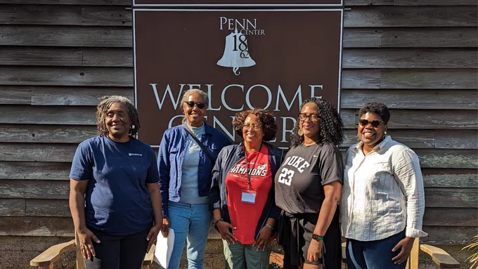 Photo of students and archivists visiting the Penn Center