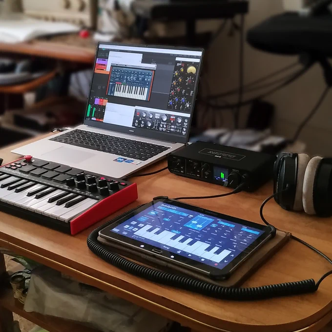 Mobile setup for music production, Honor MagicBook X16 Pro 2023 laptop, AKAI MPK mini Mk3, Beyerdynamic DT-990 Pro, MOTU M4 audio interface, Samsung Galaxy Tab Pro 10
