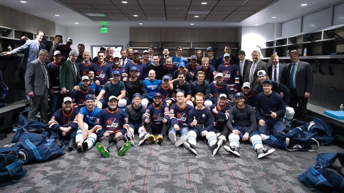 The Winnipeg Jets and their mentors celebrate a perfect 3-0-0 road trip