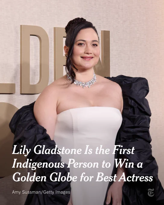 Lily Gladstone is posing for a photo on the red carpet at the Golden Globes. A headline reads: "Lily Gladstone Is the First Indigenous Person to Win a Golden Globe for Best Actress." Photo by Amy Sussman/Getty Images.