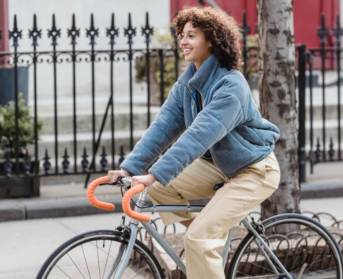 A woman riding a bike