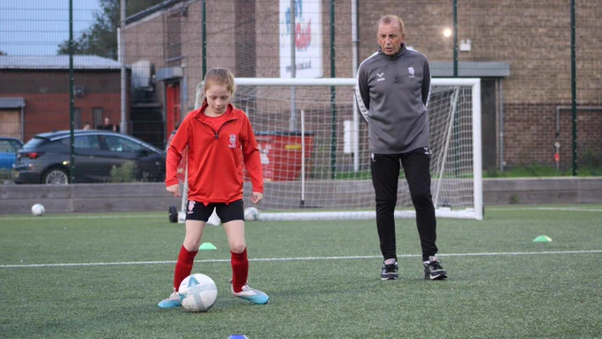 A participant of our Girls Development Centre at a coaching session.